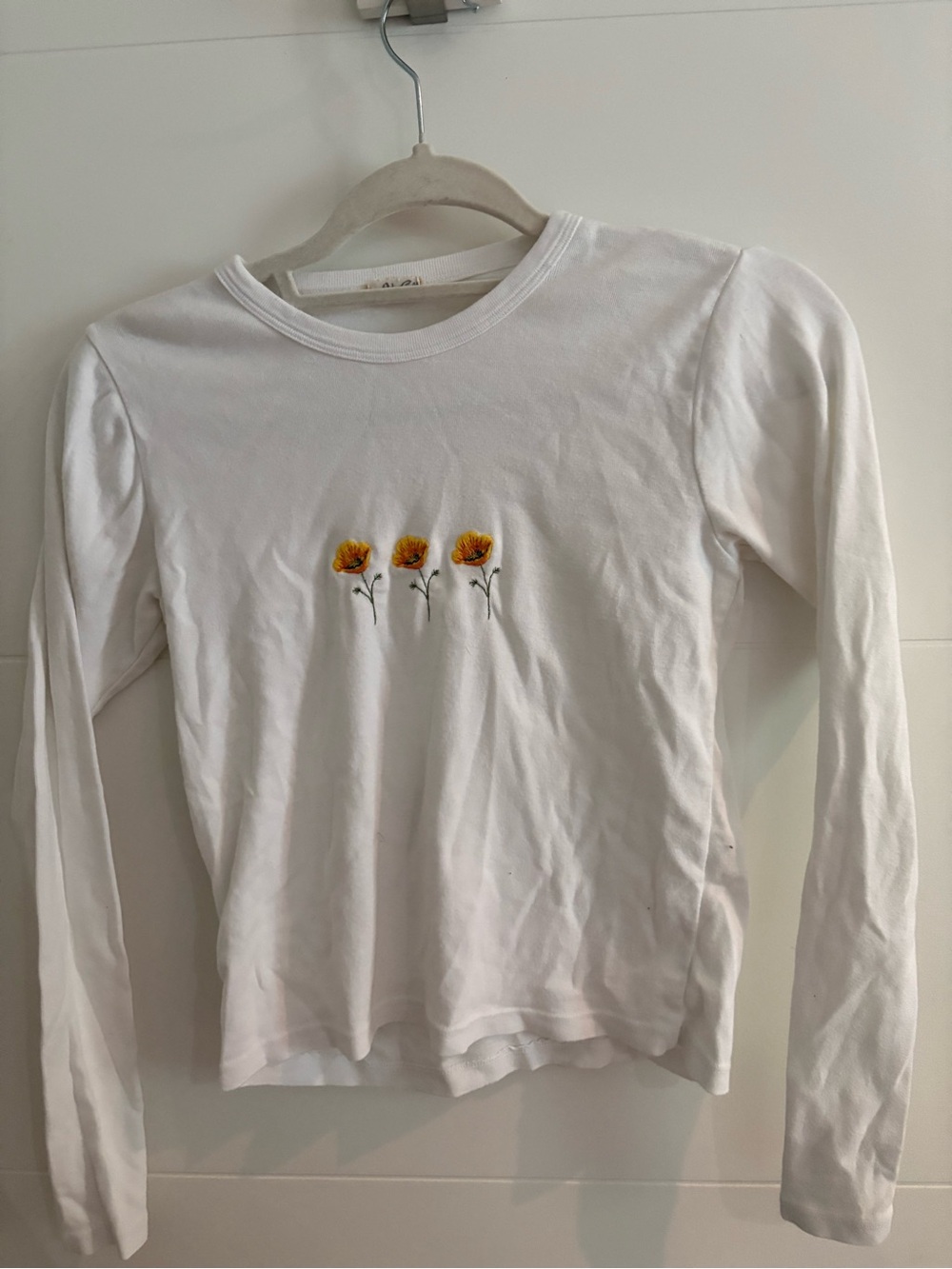Brandy Melville White Long-Sleeve Tee with Yellow Floral Embroidery
